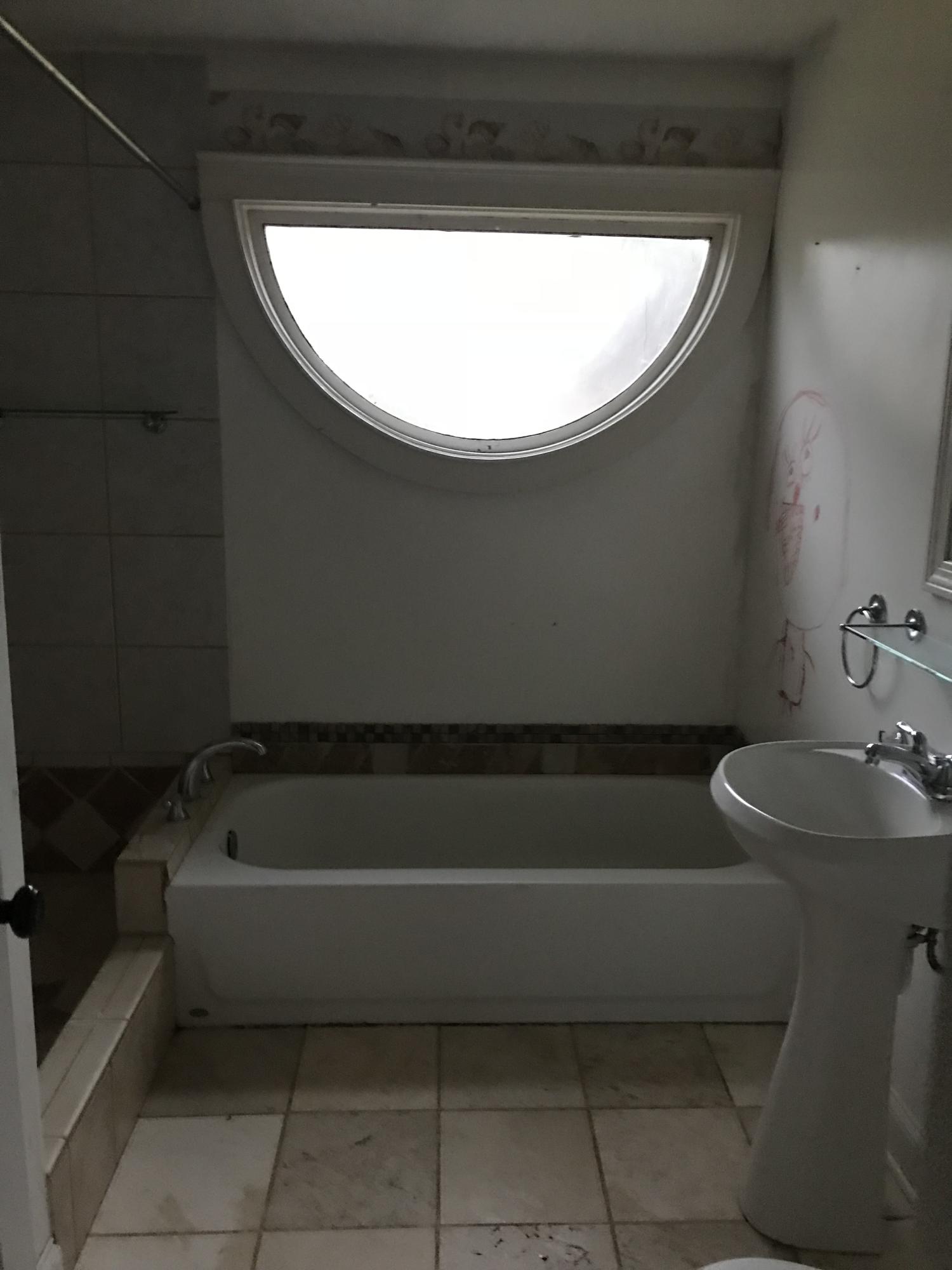 23 Stage Coach Road Centerville, MA 02632 - Photo 5 of 9 a bathroom with a toilet and a bathtub
