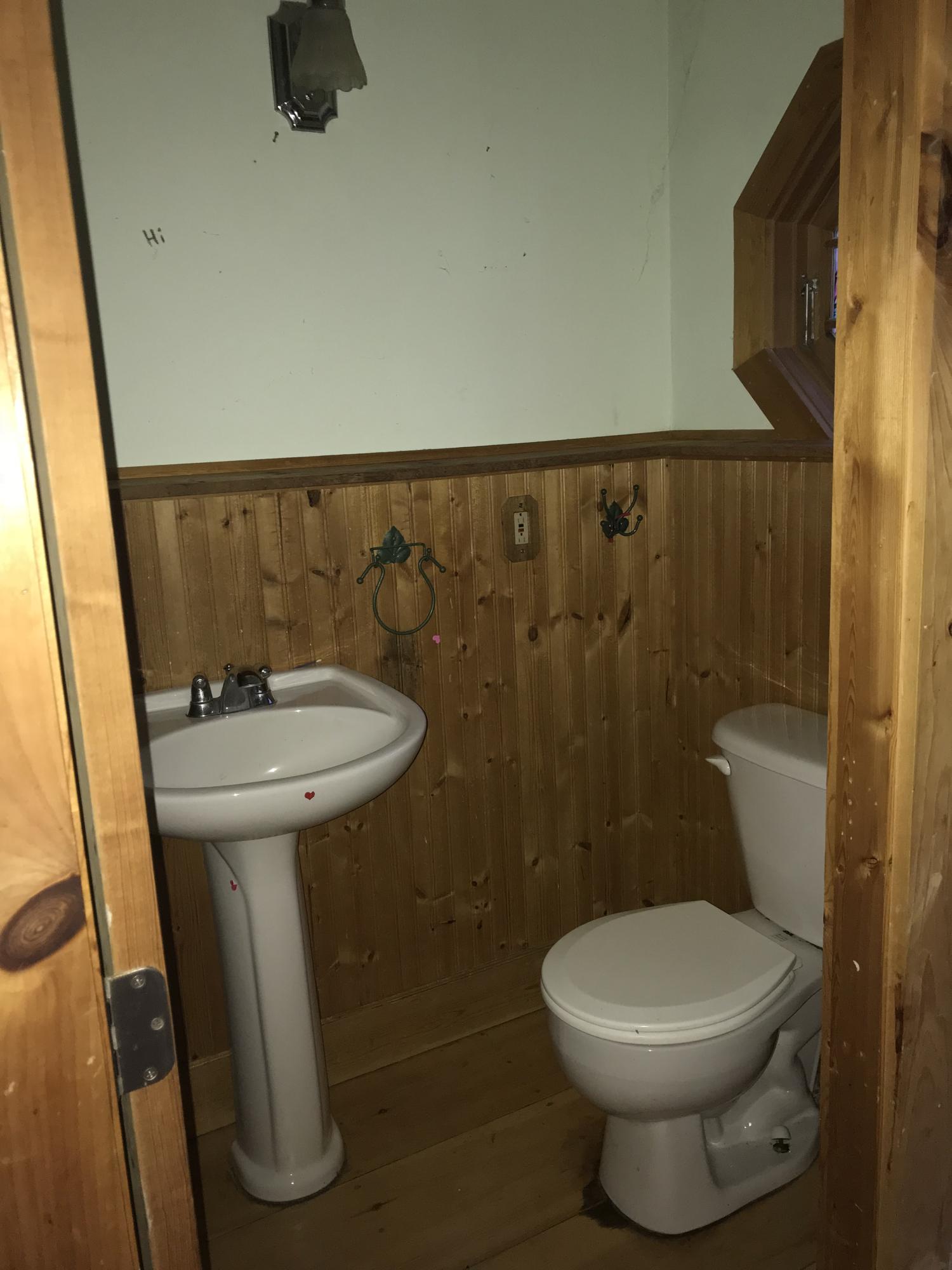 23 Stage Coach Road Centerville, MA 02632 - Photo 8 of 9 a bathroom with a sink and a toilet