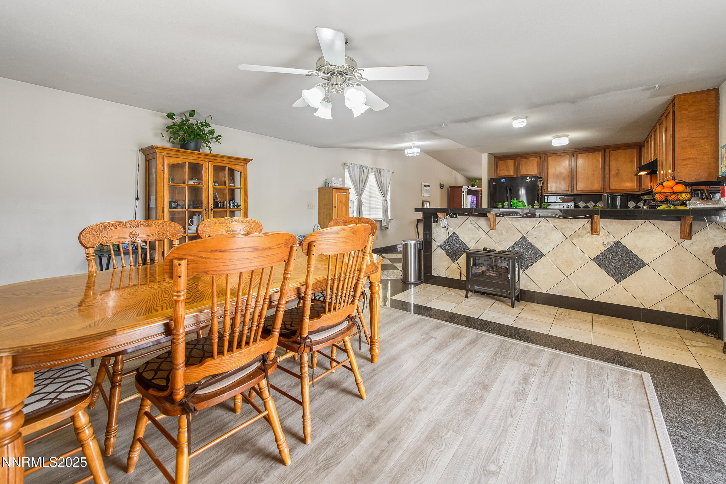 532 Yellow Jacket Road Dayton, NV 89403 - Photo 13 of 18 a view of a dining room with furniture and wooden floor