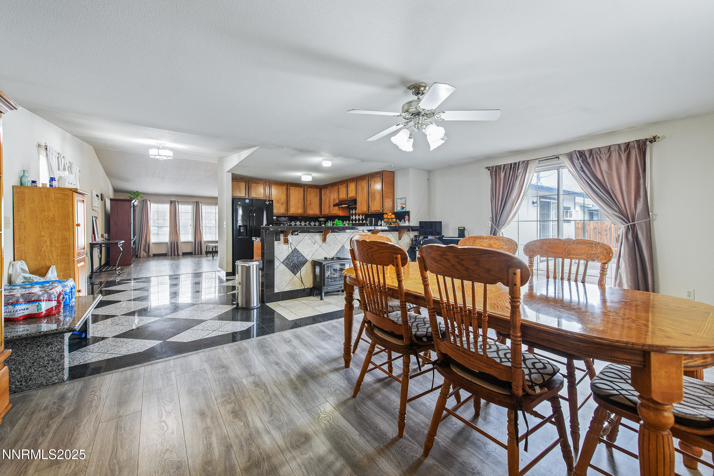 532 Yellow Jacket Road Dayton, NV 89403 - Photo 14 of 18 a view of a a dining room with furniture window and wooden floor