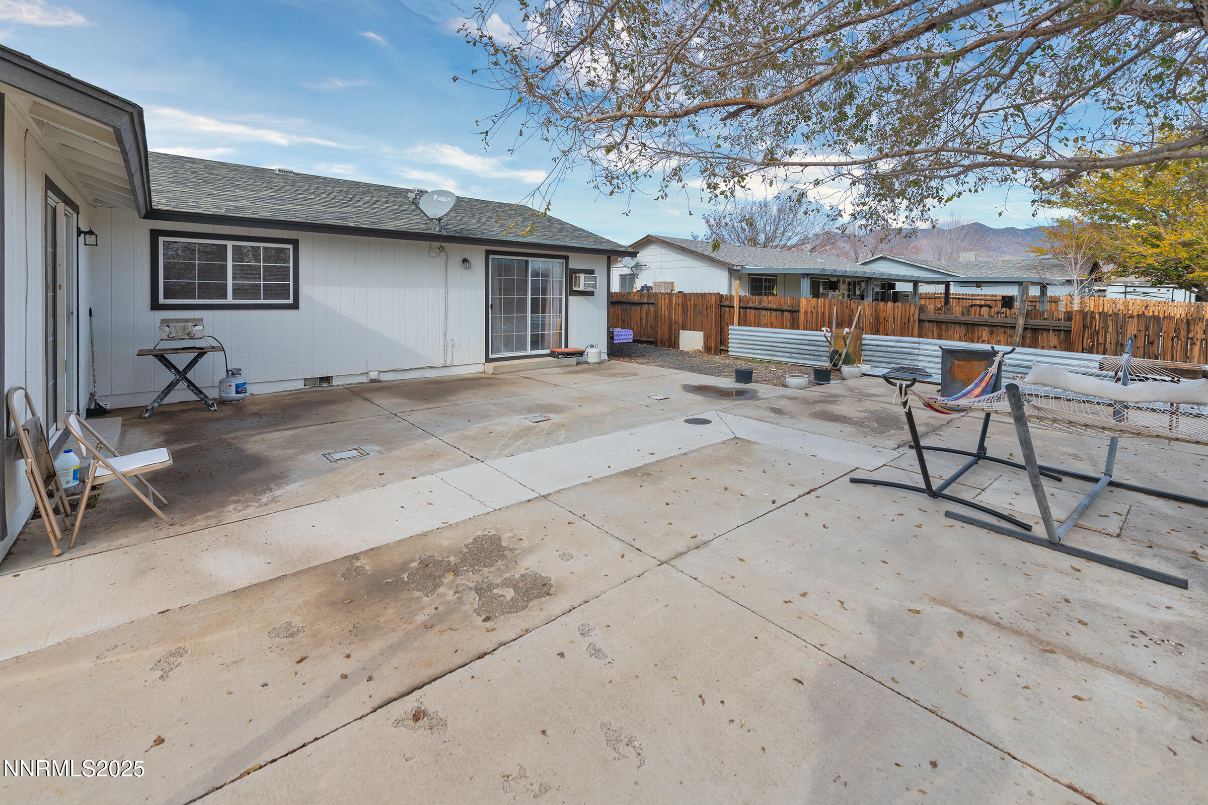 532 Yellow Jacket Road Dayton, NV 89403 - Photo 5 of 18 a patio with a table and chairs and potted plants