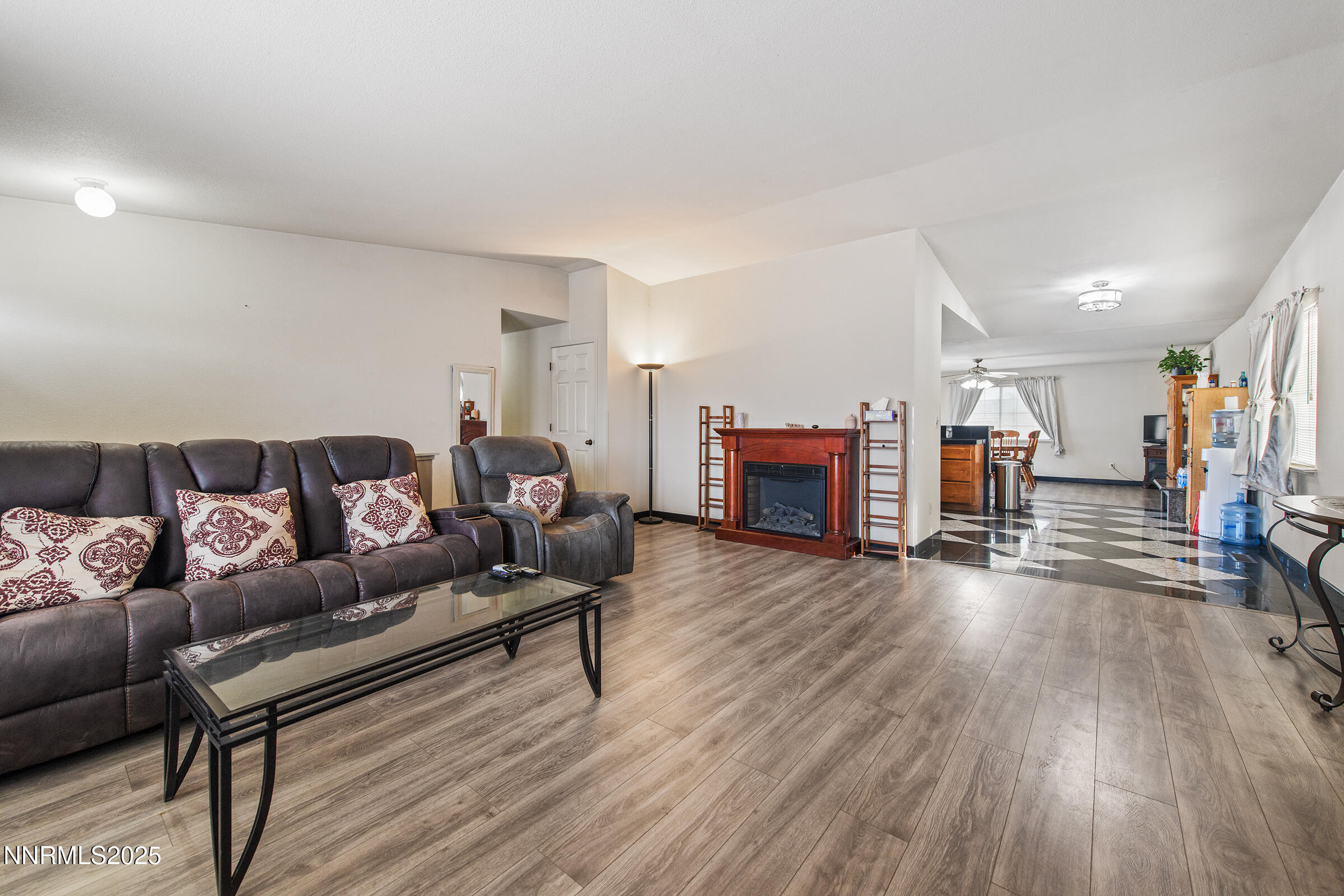 532 Yellow Jacket Road Dayton, NV 89403 - Photo 8 of 18 a living room with furniture and a fireplace