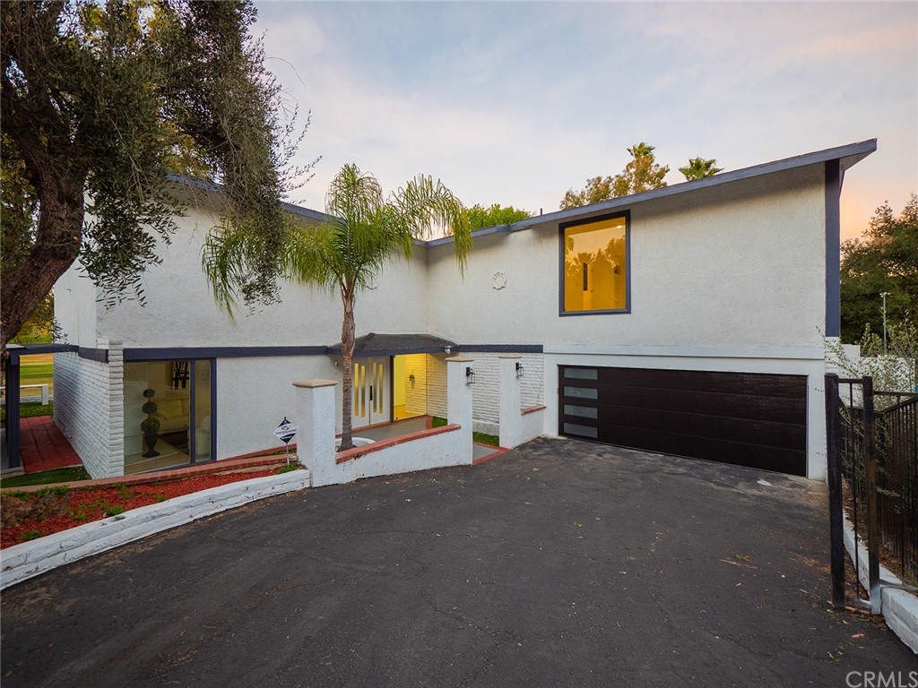 5100 Queen Street Riverside, CA 92506 - Photo 2 of 75 a view of an house with backyard and a tree