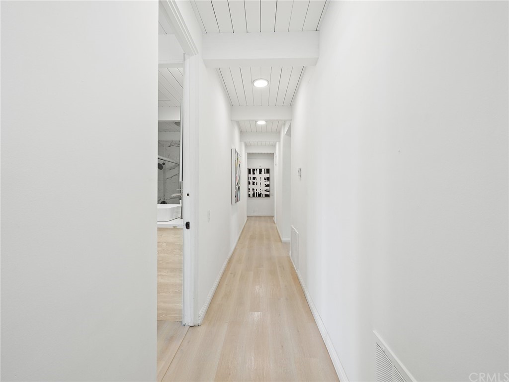 5100 Queen Street Riverside, CA 92506 - Photo 26 of 75 a view of a hallway with wooden floor