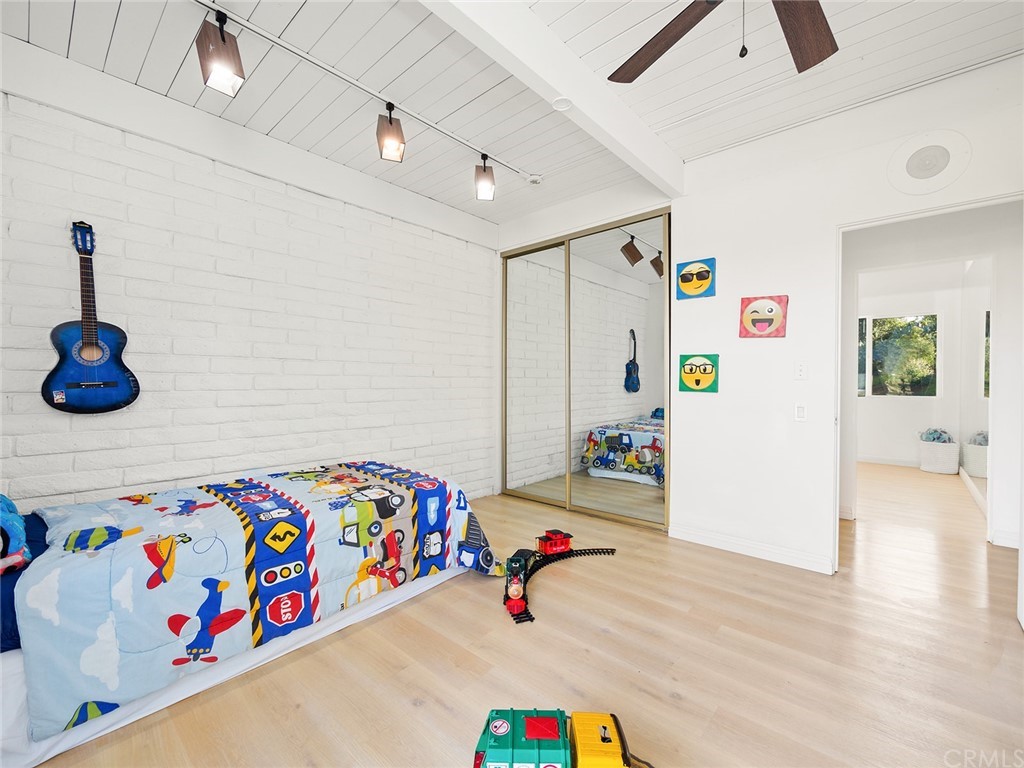 5100 Queen Street Riverside, CA 92506 - Photo 33 of 75 a bedroom with a bed and a dresser