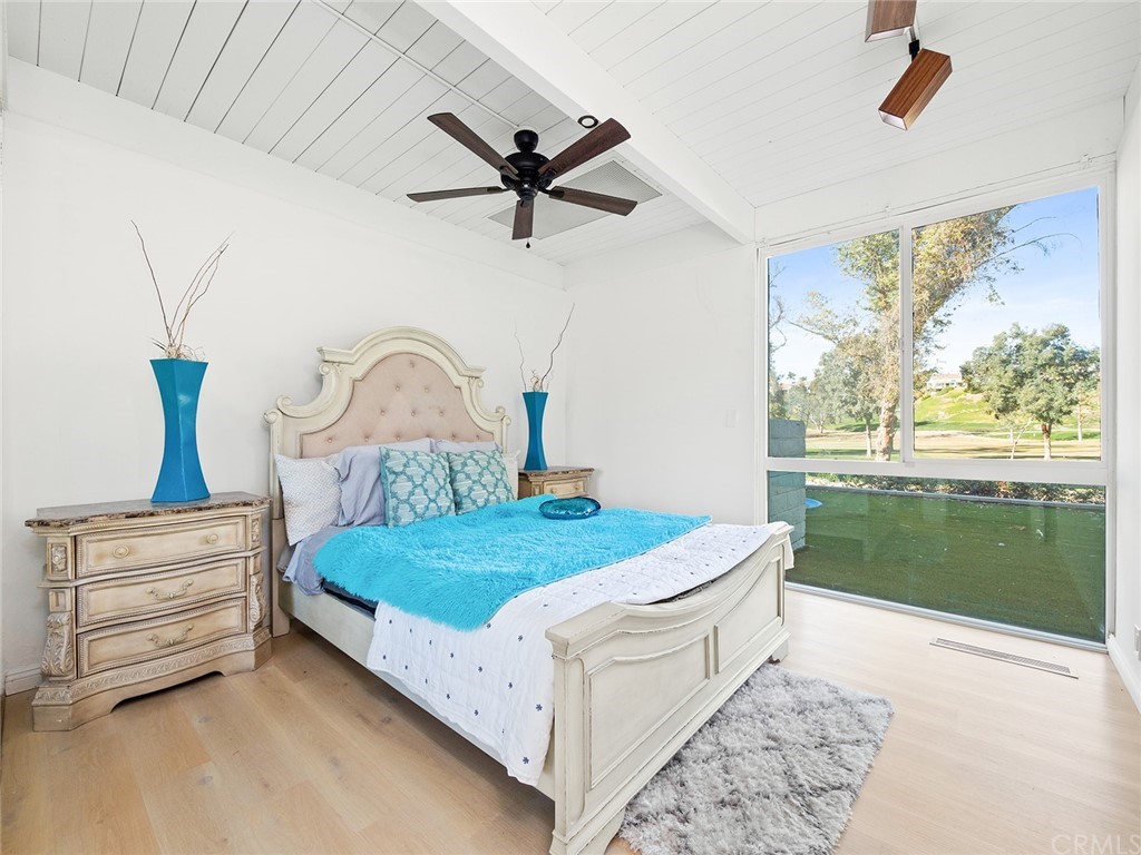 5100 Queen Street Riverside, CA 92506 - Photo 37 of 75 a bedroom with a bed and a dresser