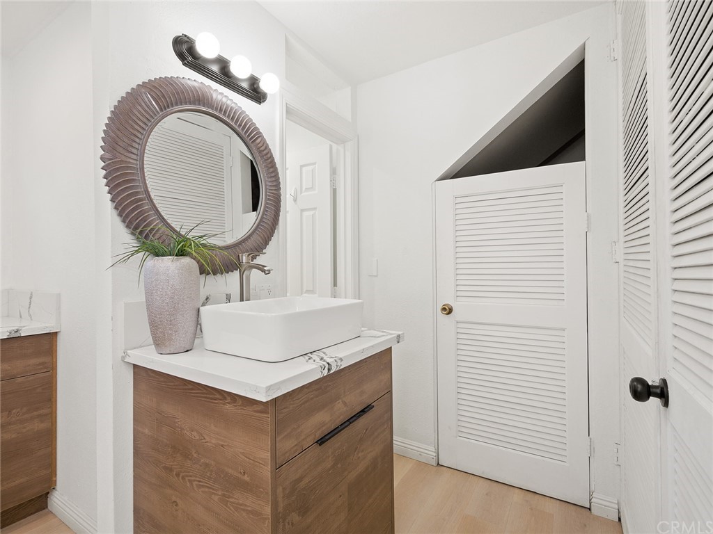 5100 Queen Street Riverside, CA 92506 - Photo 42 of 75 a bathroom with a toilet and a sink
