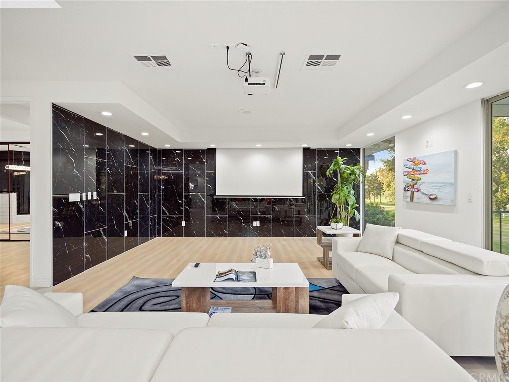 5100 Queen Street Riverside, CA 92506 - Photo 47 of 75 a living room with couch and dining table