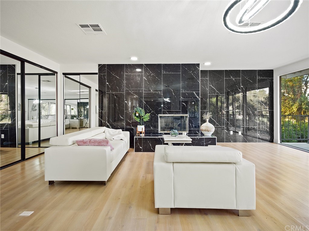 5100 Queen Street Riverside, CA 92506 - Photo 53 of 75 a living room with furniture and a large window