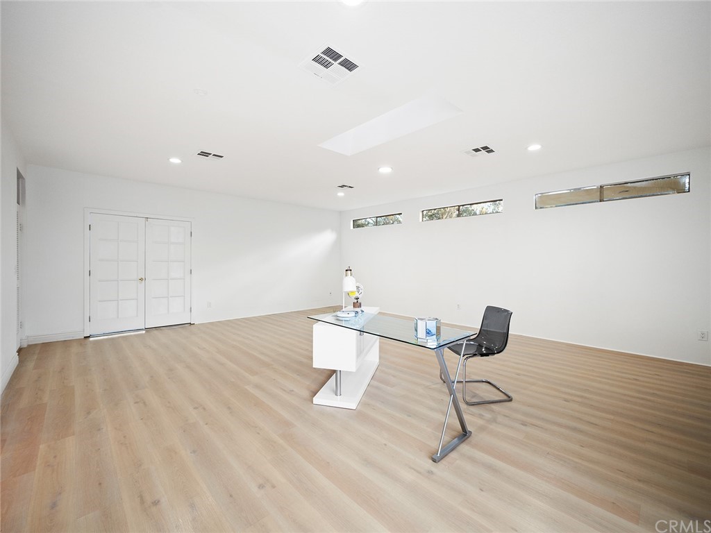 5100 Queen Street Riverside, CA 92506 - Photo 63 of 75 a view of a room with wooden floor and windows
