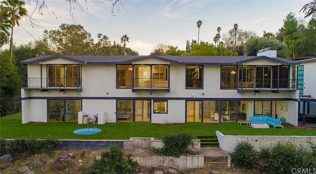5100 Queen Street Riverside, CA 92506 - Photo 75 of 75 a front view of a house with a yard and potted plants