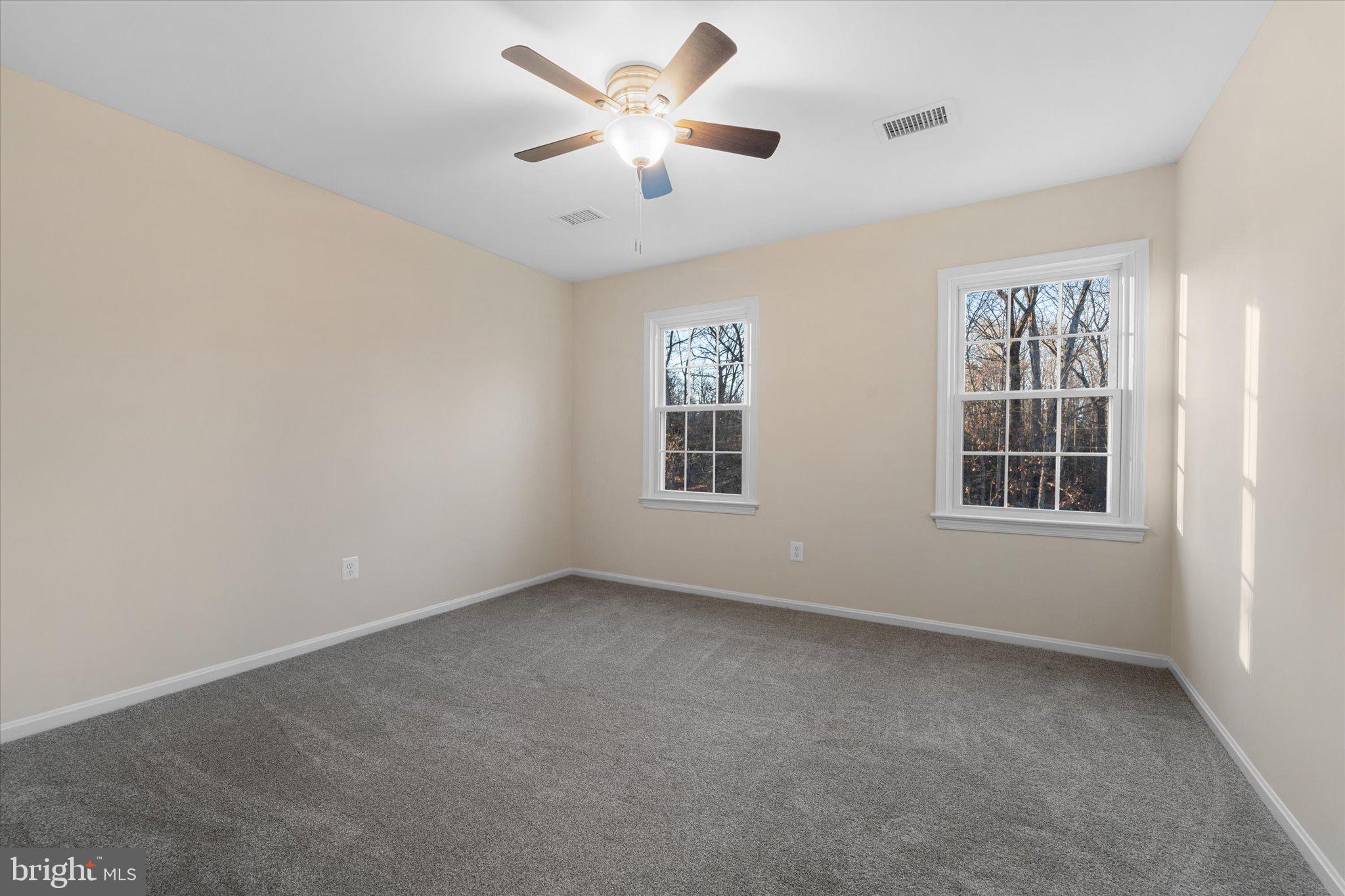 8016 Stillbrooke Road Manassas, VA 20112 - Photo 28 of 41 a view of an empty room with a window