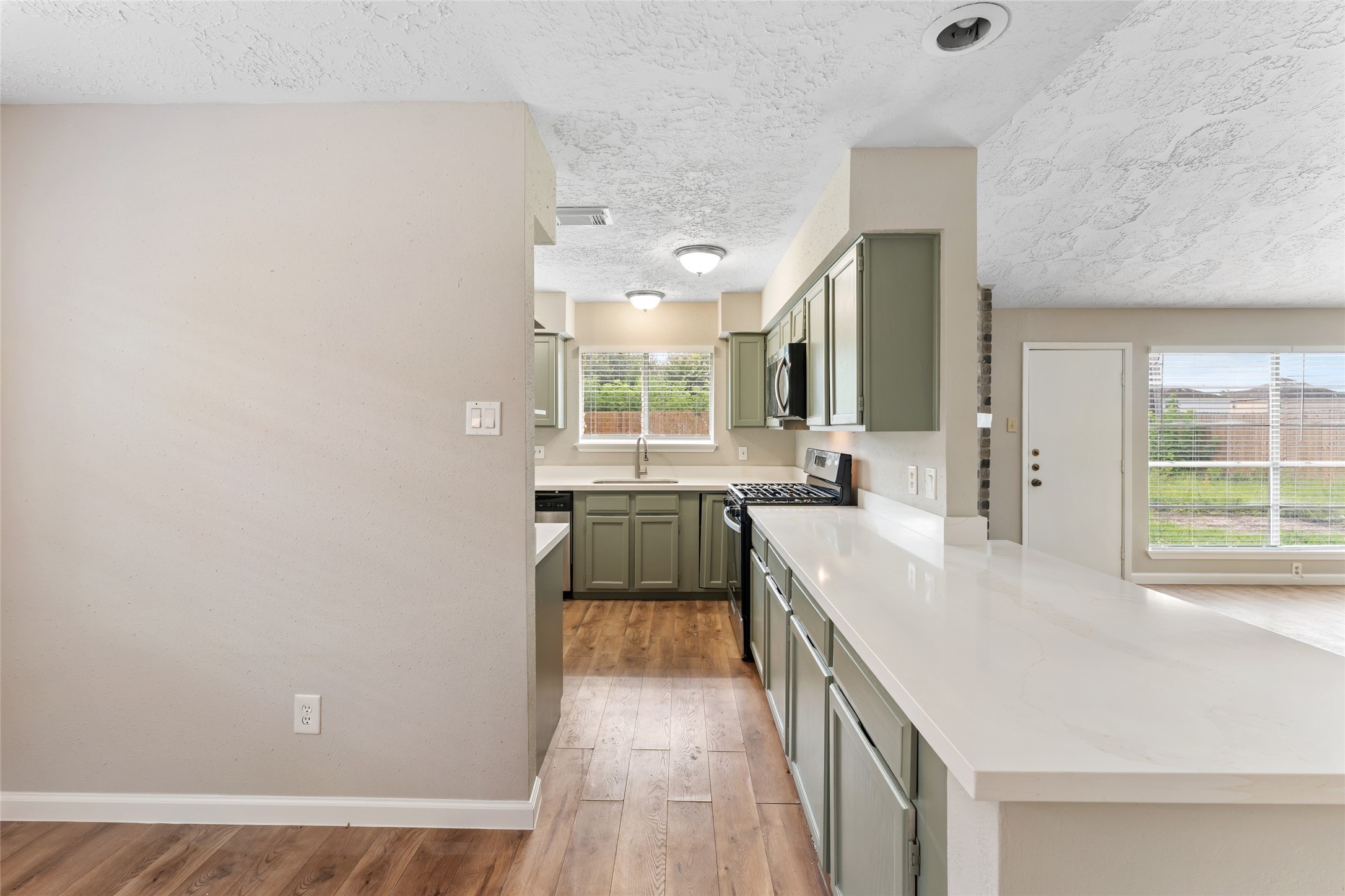 2327 Rittenmore Drive Missouri City, TX 77489 - Photo 10 of 16 Ample kitchen counter space for prepping and serving.