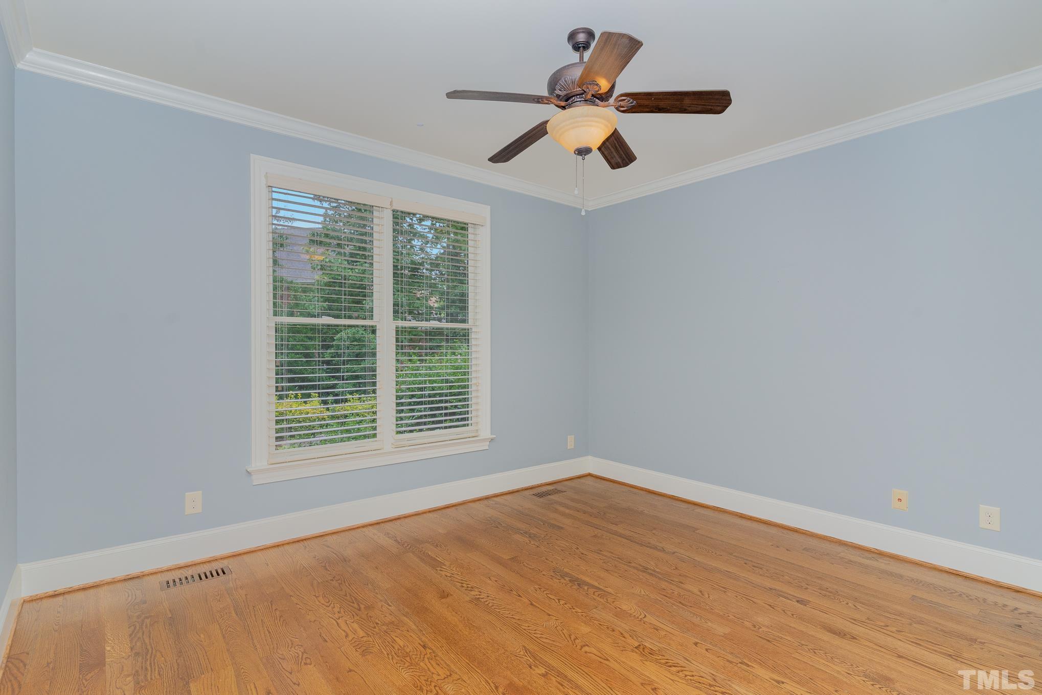 5004 Greyhawk Place Apex, NC 27539 - Photo 12 of 36 a view of an empty room with a window