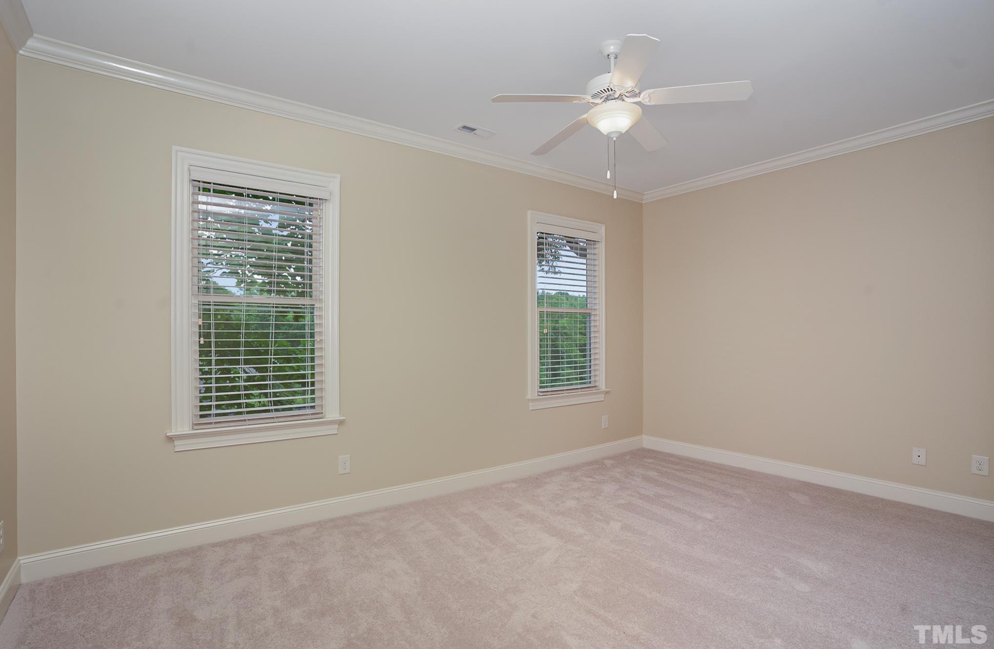 5004 Greyhawk Place Apex, NC 27539 - Photo 18 of 36 a view of an empty room with a window