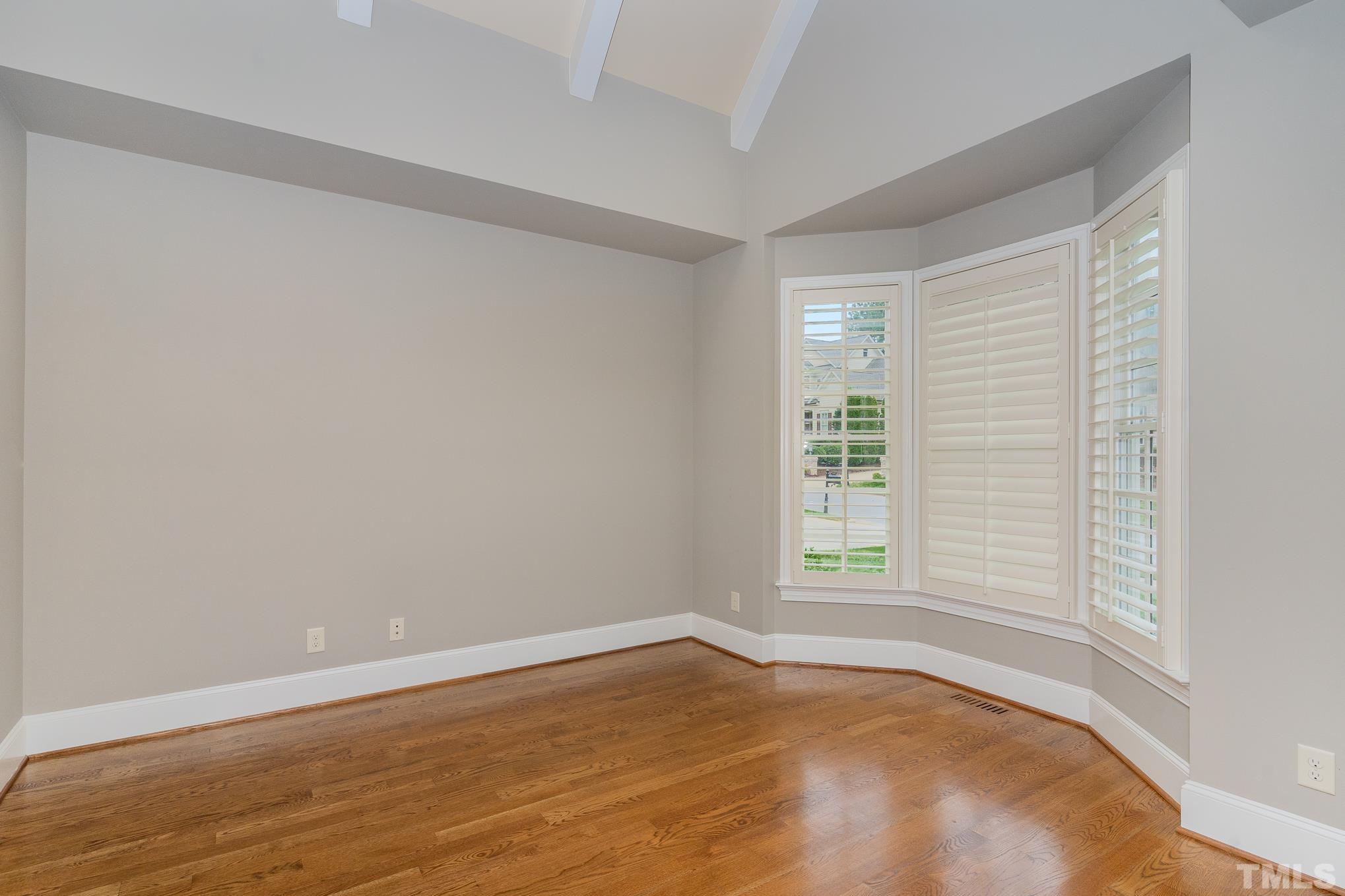 5004 Greyhawk Place Apex, NC 27539 - Photo 3 of 36 a view of an empty room with a window