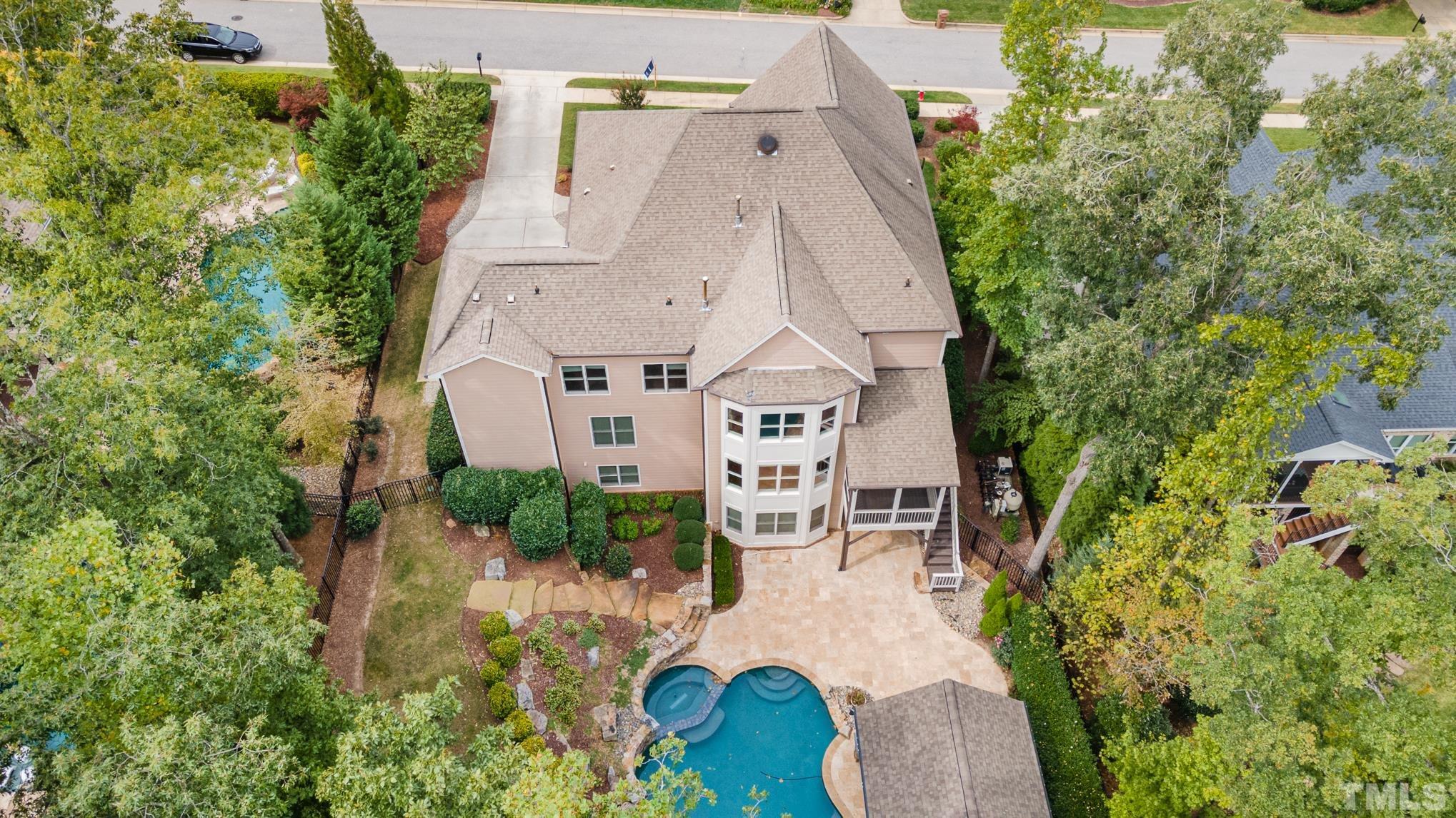 5004 Greyhawk Place Apex, NC 27539 - Photo 35 of 36 an aerial view of a house with a yard