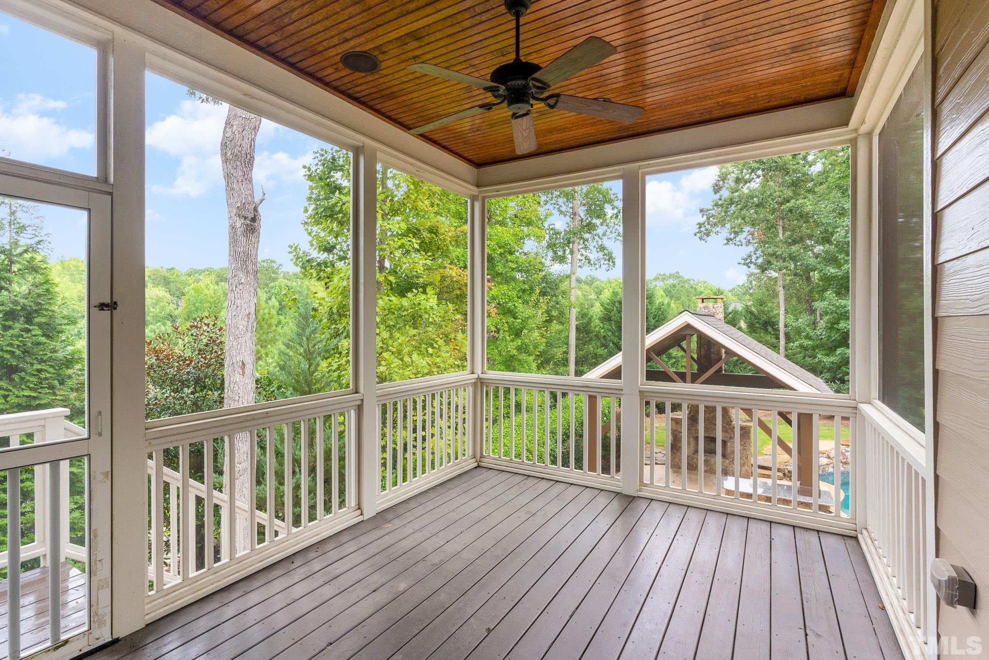 5004 Greyhawk Place Apex, NC 27539 - Photo 10 of 36 a view of a wooden deck next to a yard