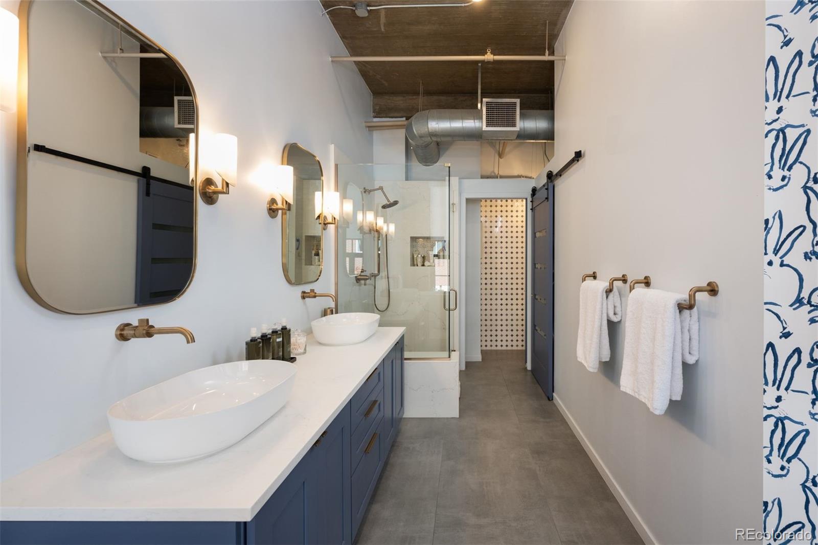 1801 Wynkoop Street, Unit 603 Denver, CO 80202 - Photo 14 of 40 a bathroom with a sink and mirror