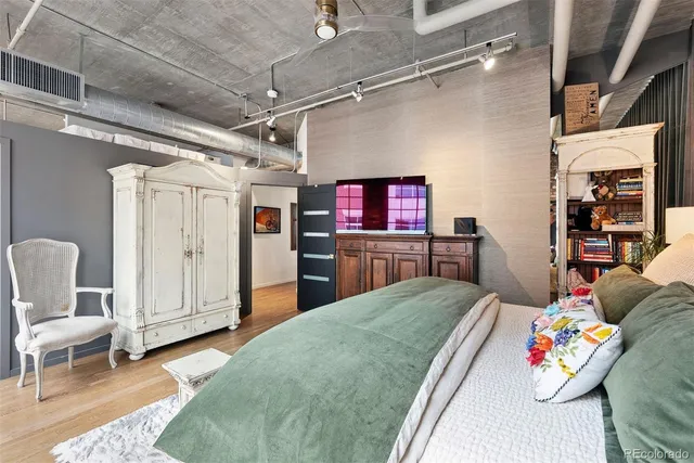 a spacious bathroom with a double vanity sink mirror and bathtub