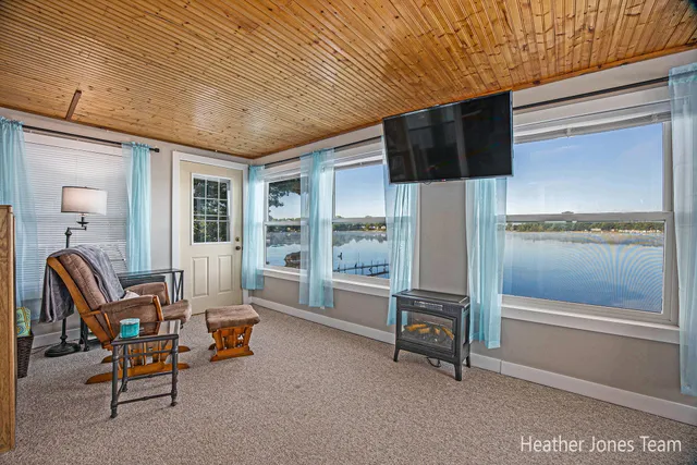 $419,000 | 16375 Bass Lake Avenue Northeast, Gowen, MI 49326