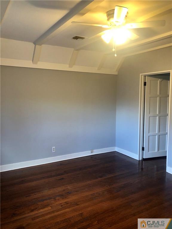 425 Chain O' Hills Road Colonia, NJ 07067 - Photo 12 of 16 a view of a room with wooden floor