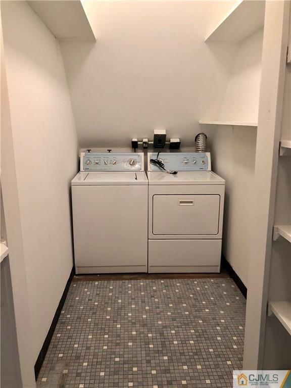425 Chain O' Hills Road Colonia, NJ 07067 - Photo 13 of 16 a utility room with dryer and washer