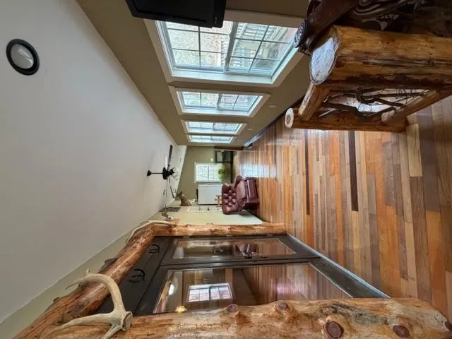 a bathroom with a toilet a sink and shower