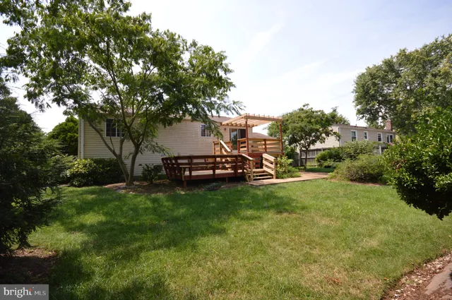 a view of a backyard with garden