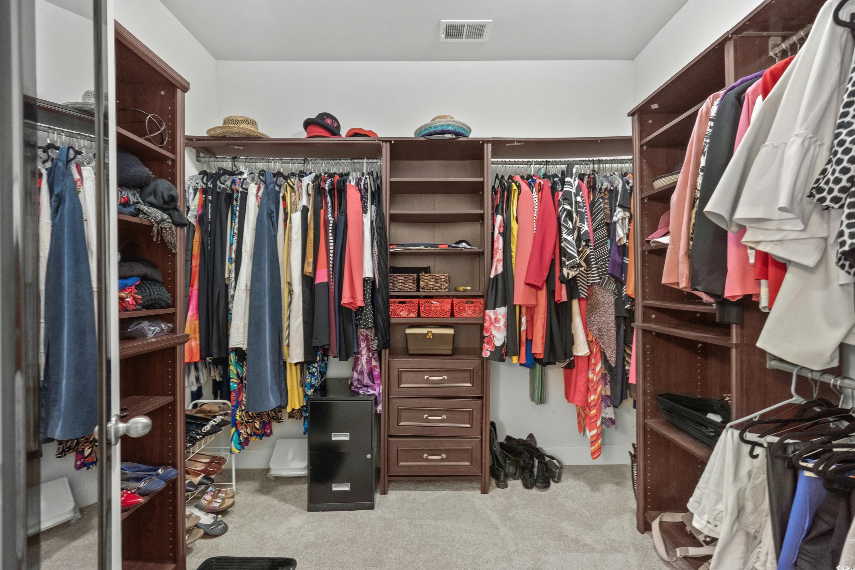 4246 Livorn Loop Myrtle Beach, SC 29579 - Photo 20 of 40 Spacious closet with carpet flooring and visible vents