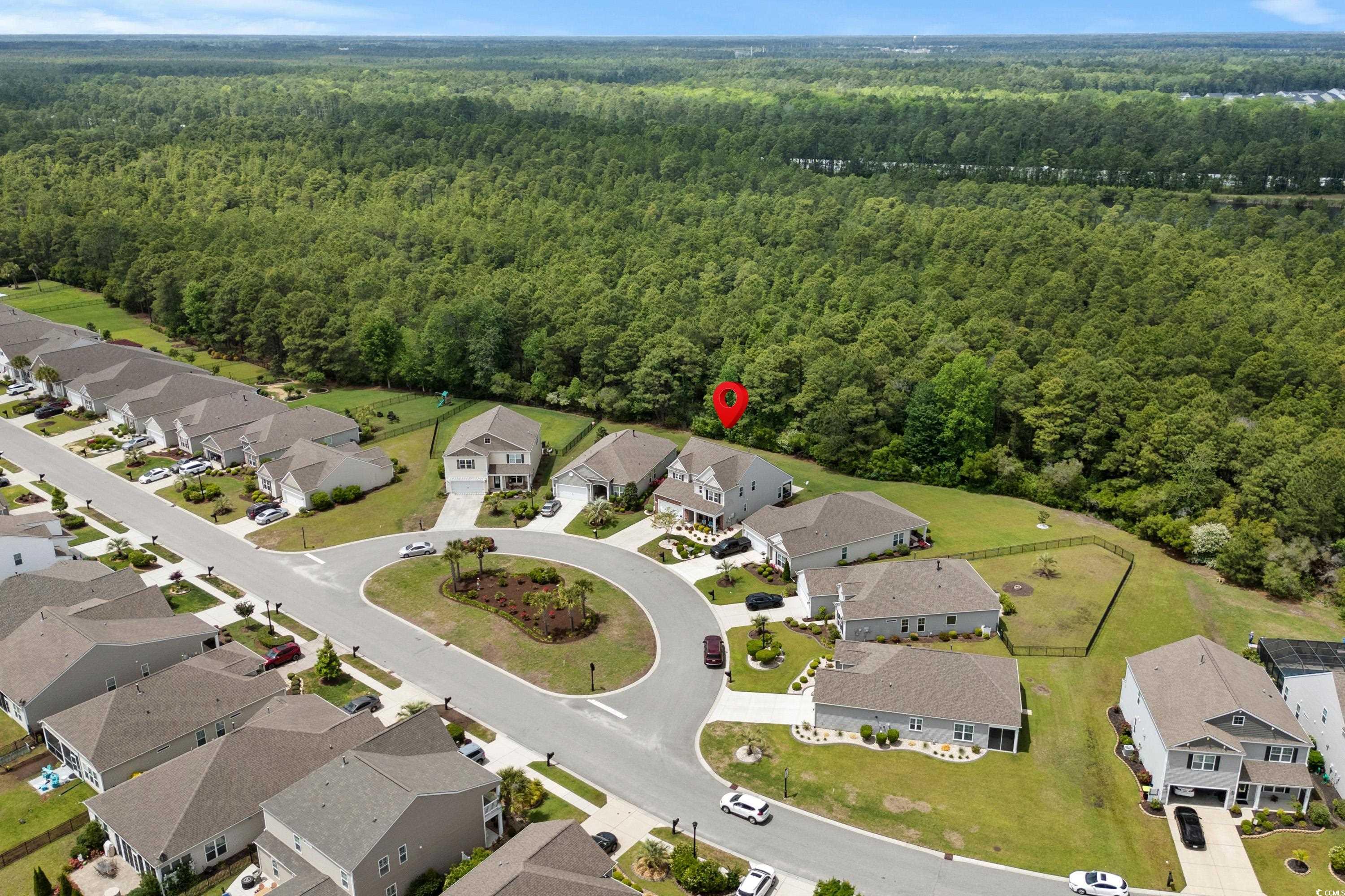 4246 Livorn Loop Myrtle Beach, SC 29579 - Photo 33 of 40 Aerial view with a view of trees and a residential view