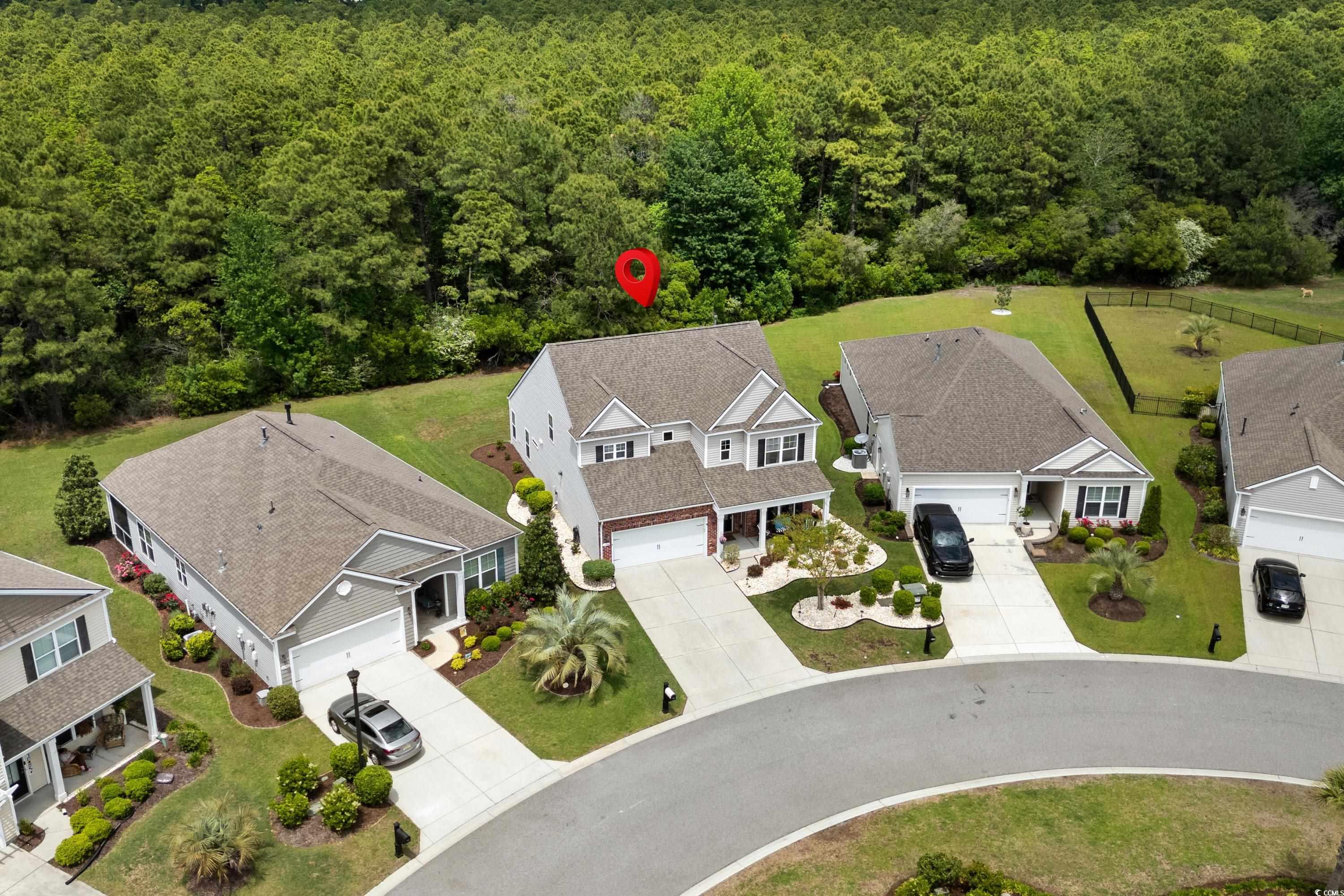 4246 Livorn Loop Myrtle Beach, SC 29579 - Photo 4 of 40 Drone / aerial view with a residential view and a view of trees