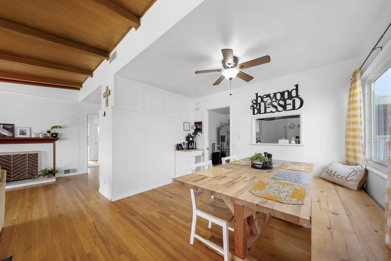 1243 Hardin Drive El Cajon, CA 92020 - Photo 12 of 32 a spacious bedroom with a bed and a chandelier