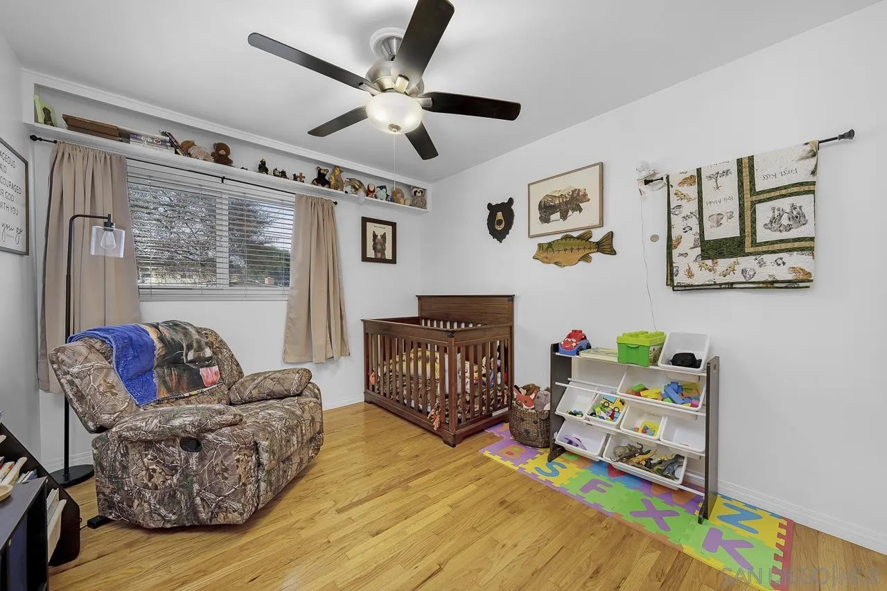 1243 Hardin Drive El Cajon, CA 92020 - Photo 16 of 32 a living room with furniture and a window