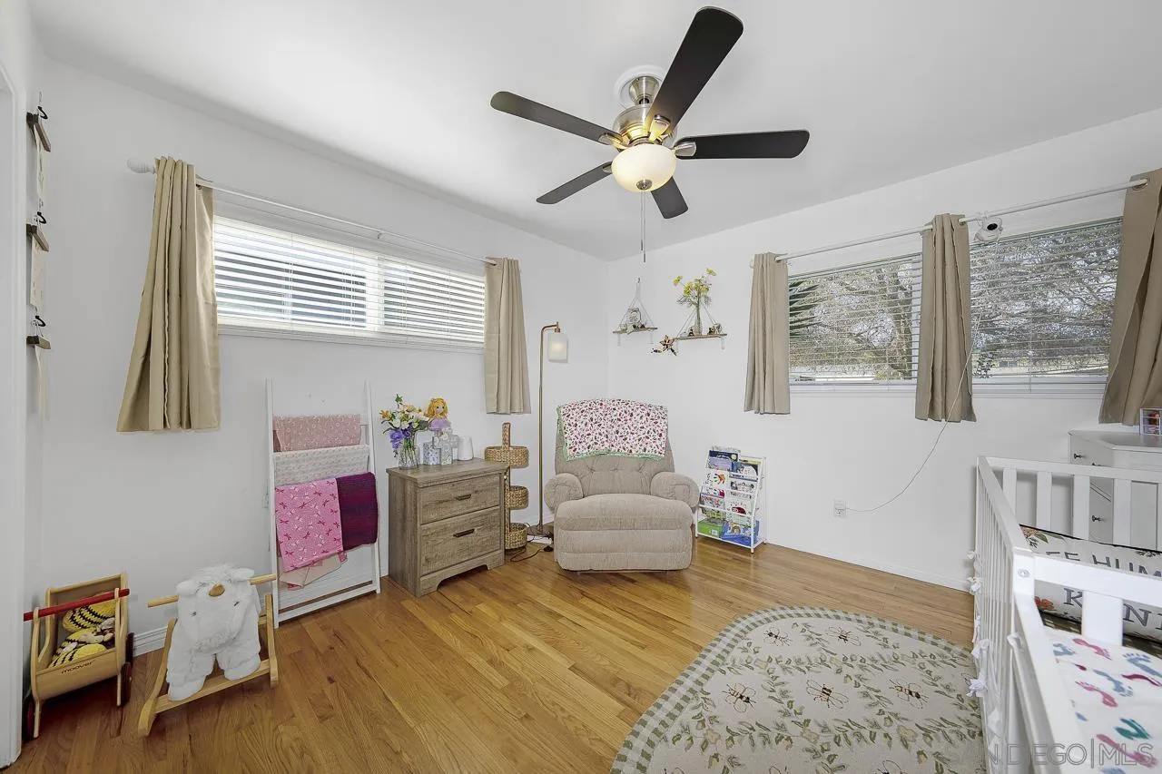 1243 Hardin Drive El Cajon, CA 92020 - Photo 18 of 32 a bedroom with furniture and a window
