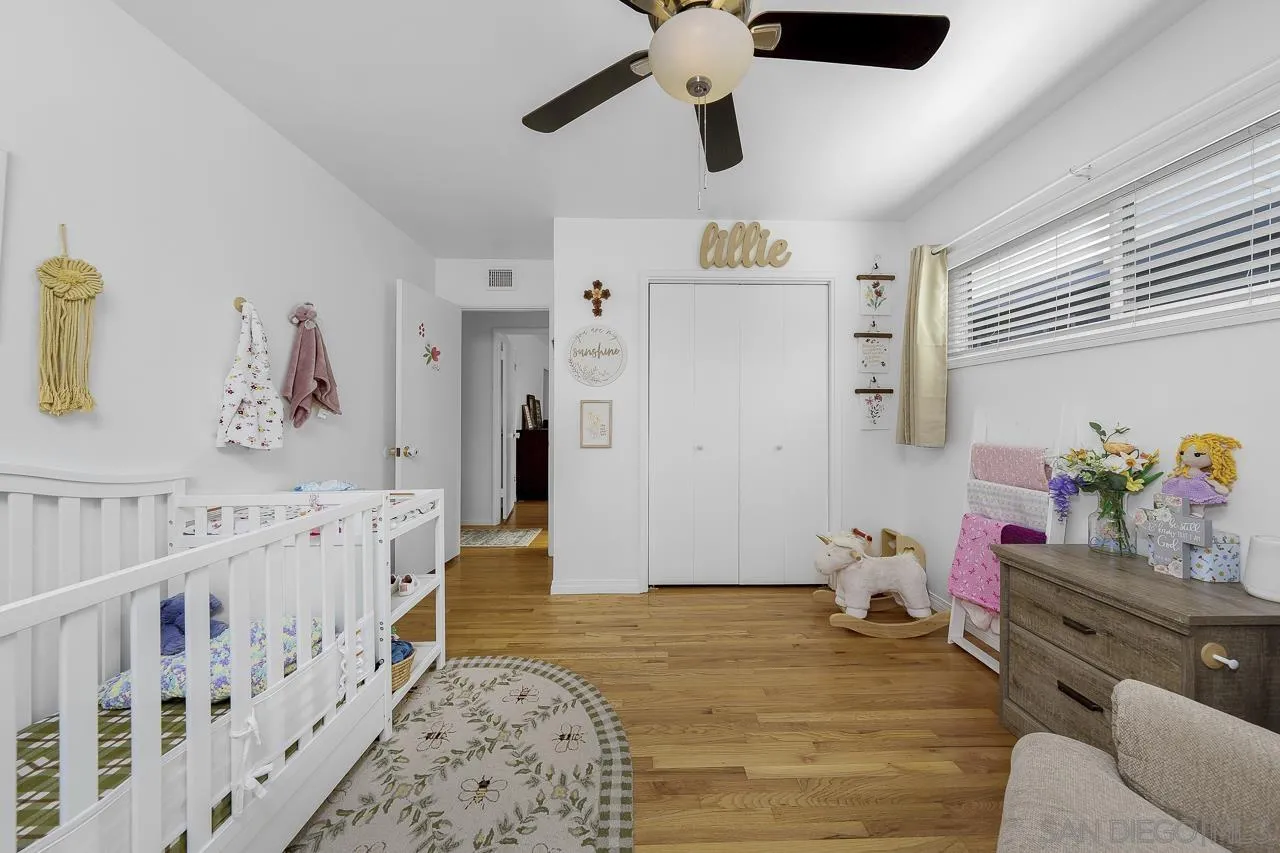 1243 Hardin Drive El Cajon, CA 92020 - Photo 19 of 32 a bedroom with furniture and wooden floor