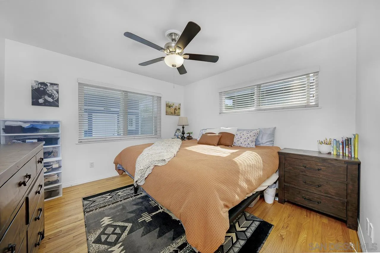 1243 Hardin Drive El Cajon, CA 92020 - Photo 20 of 32 a bedroom with a bed and a dresser
