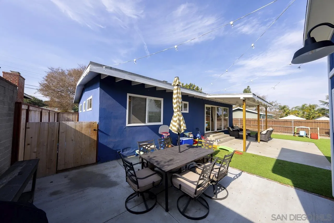 1243 Hardin Drive El Cajon, CA 92020 - Photo 27 of 32 a backyard of a house with table and chairs