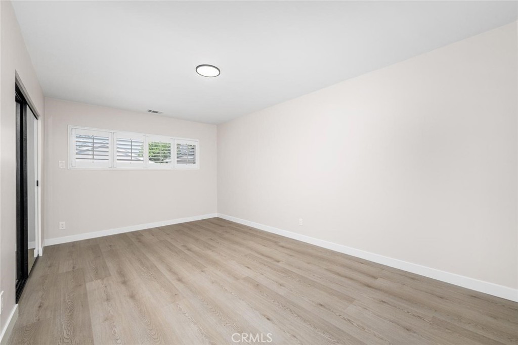 3819 North Studebaker Road Long Beach, CA 90808 - Photo 16 of 62 Unwind in the inviting primary suite, a relaxing sanctuary awaiting your personal touch and design vision.
