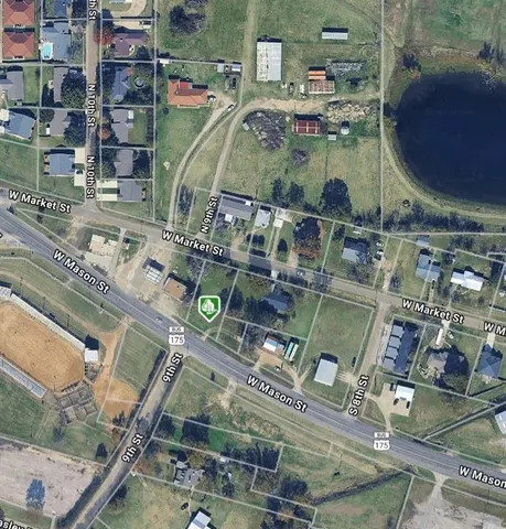 a view of a big yard next to a house