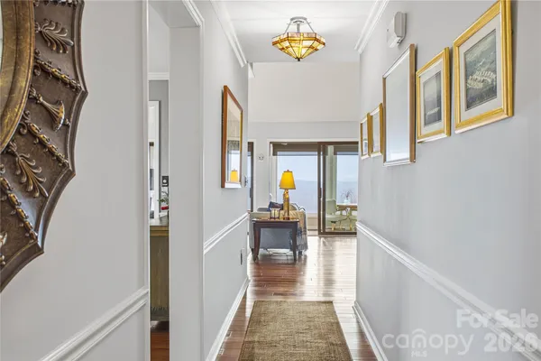 a view of living room with furniture and rug