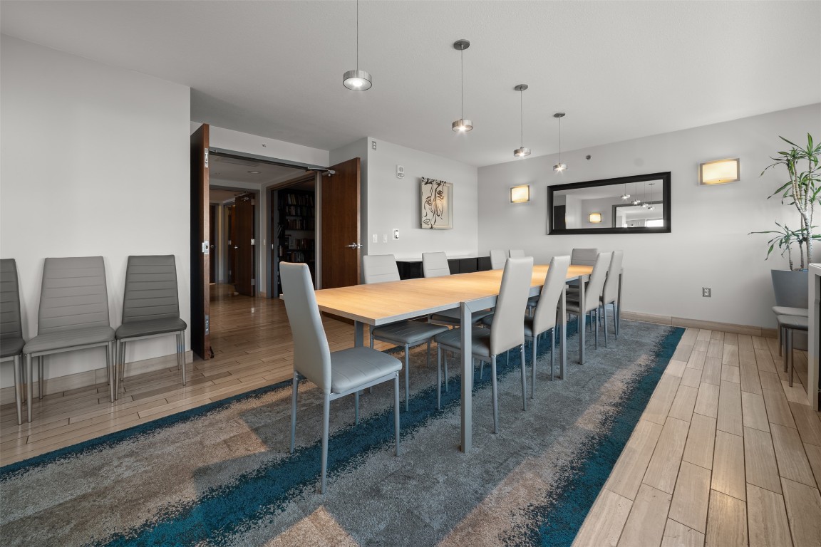 300 Bowie Street, Unit 2405 Austin, TX 78703 - Photo 34 of 39 a view of a dining room with furniture