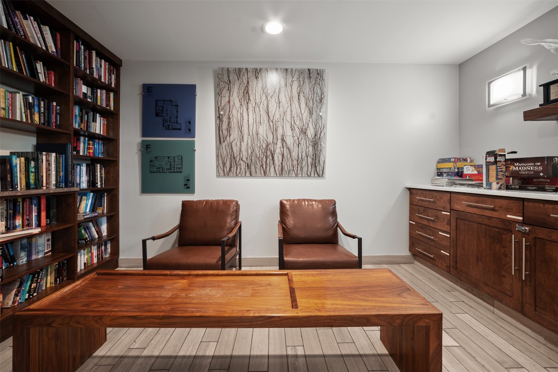 300 Bowie Street, Unit 2405 Austin, TX 78703 - Photo 35 of 39 a room with furniture and book shelf