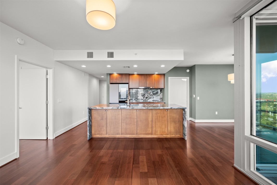 300 Bowie Street, Unit 2405 Austin, TX 78703 - Photo 10 of 39 a view of kitchen with wooden floor