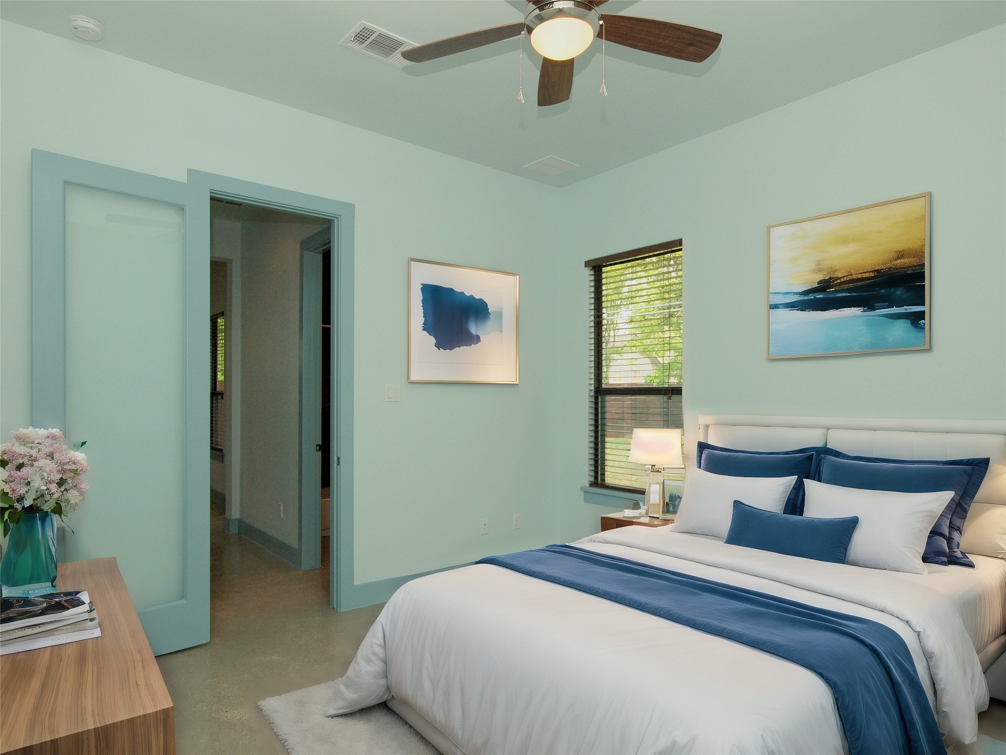 306 Franklin Boulevard, Unit B Austin, TX 78751 - Photo 3 of 23 a bedroom with a bed and a chandelier