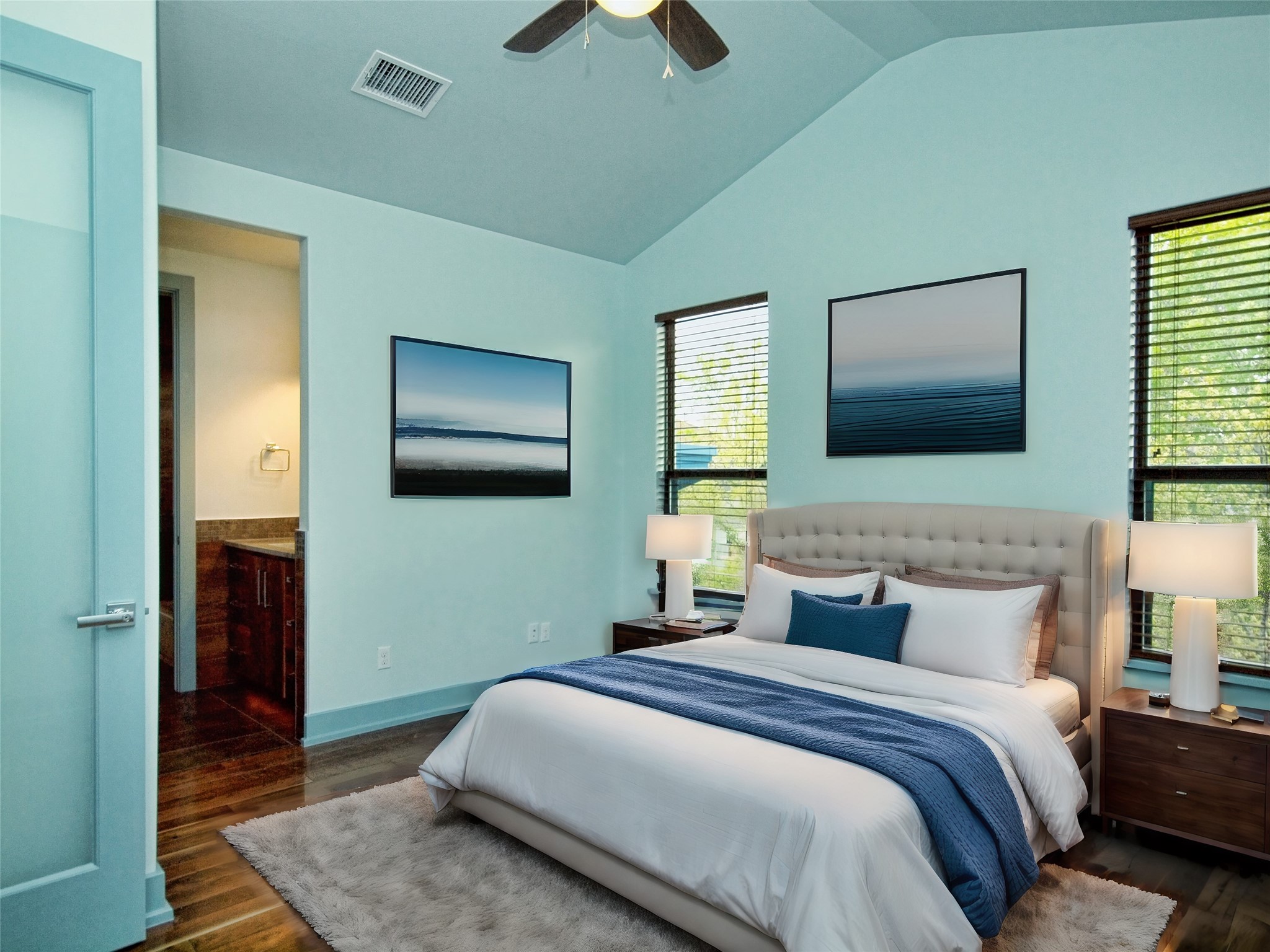 306 Franklin Boulevard, Unit B Austin, TX 78751 - Photo 4 of 23 a bedroom with a bed and a flat screen tv