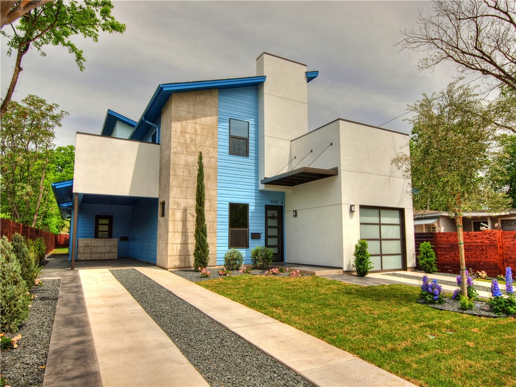 306 Franklin Boulevard, Unit B Austin, TX 78751 - Photo 10 of 23 a view of a house with a yard