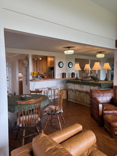 3375 Foothill Road, Unit 533 Carpinteria, CA 93013 - Photo 6 of 12 a living room with furniture and a large window