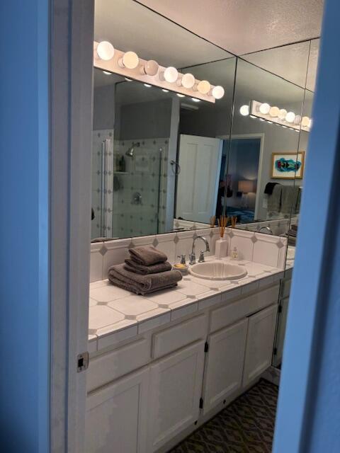 3375 Foothill Road, Unit 533 Carpinteria, CA 93013 - Photo 8 of 12 a bathroom with a sink double vanity and a mirror