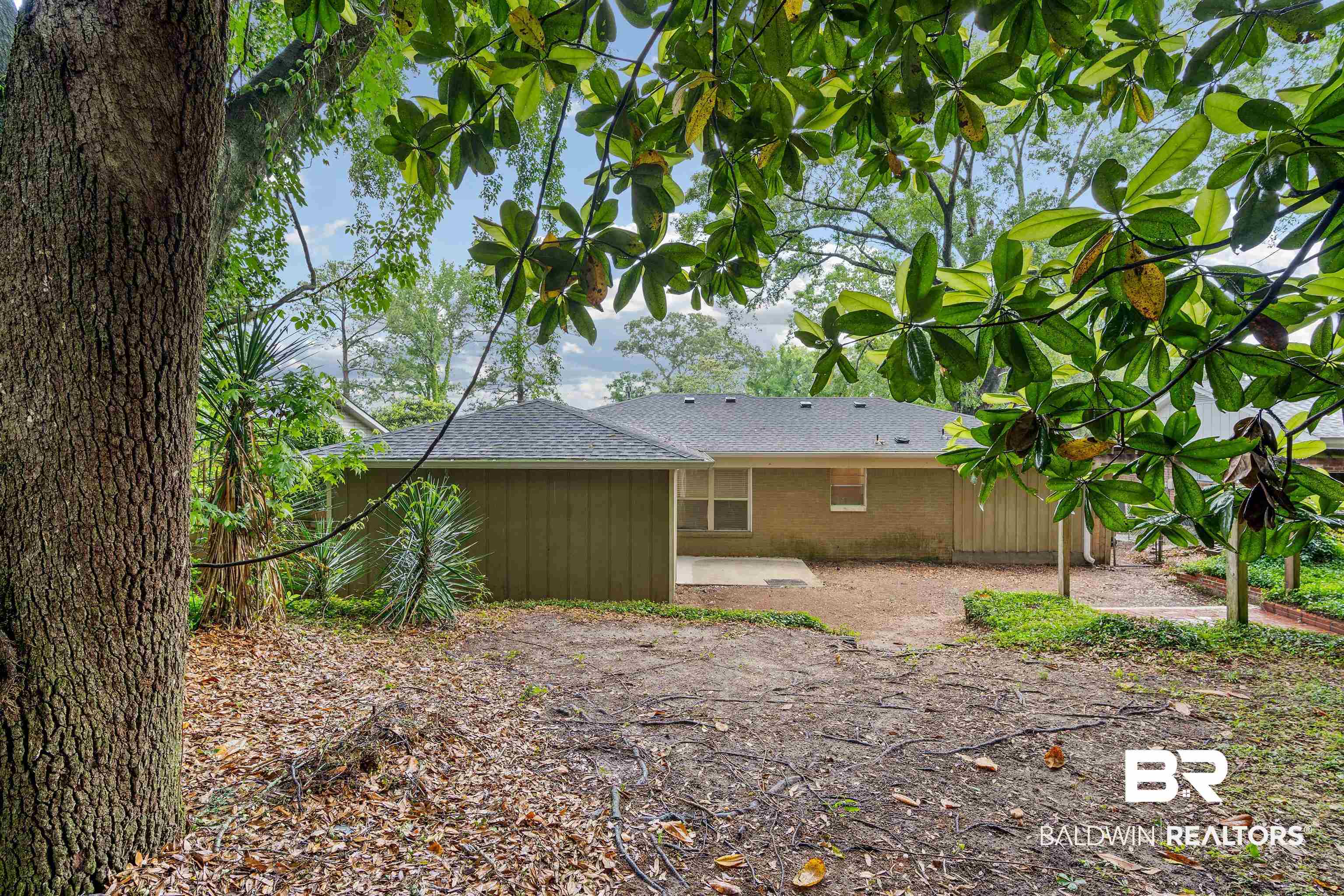 570 Markham Drive Mobile, AL 36609 - Photo 25 of 25 Back of house with a shingled roof
